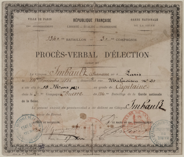 Altes Dokument mit zwei Stempeln, das wie ein handbeschriebener Wahlschein aussieht.