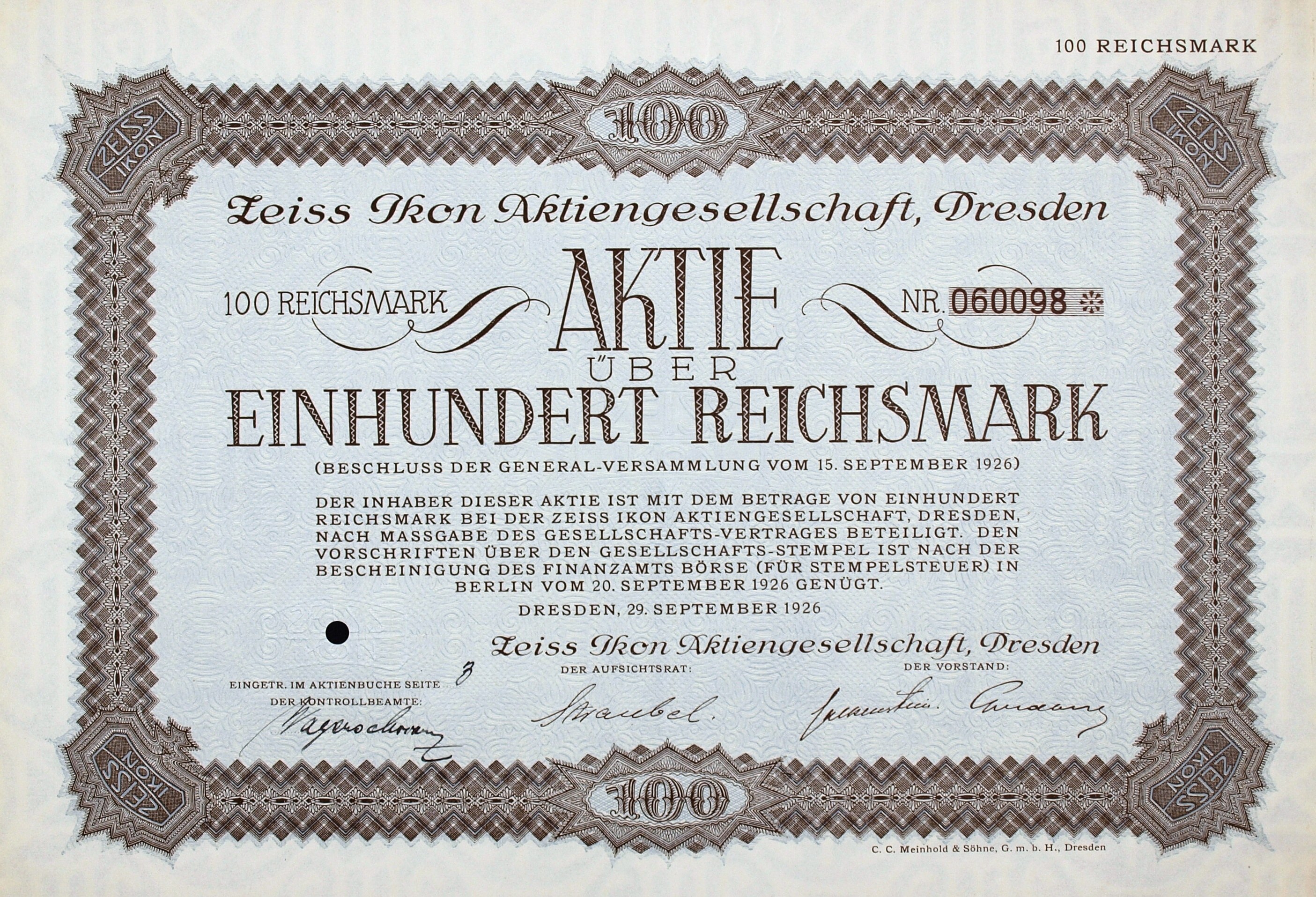 Deutsches Aktienzertifikat für 100 Reichsmark mit schwarzem Rand und gedrucktem Text.