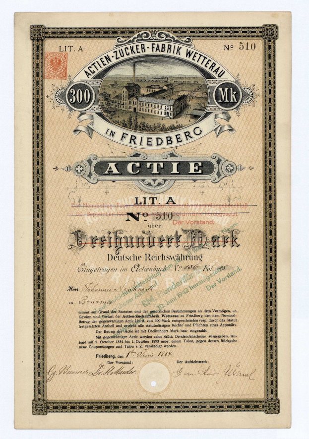 Altes deutsches Aktienzertifikat mit einer Abbildung eines Gebäudes und Text, der likely den aktiven Status angibt.